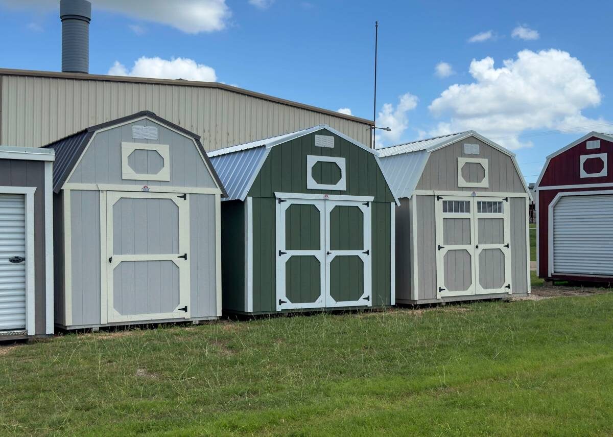 Row of lofted barns for sale at Tiny Hive in Giddings, TX