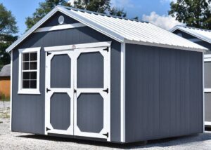 Derksen Best Value wood utility shed at Tiny Hive Giddings, TX