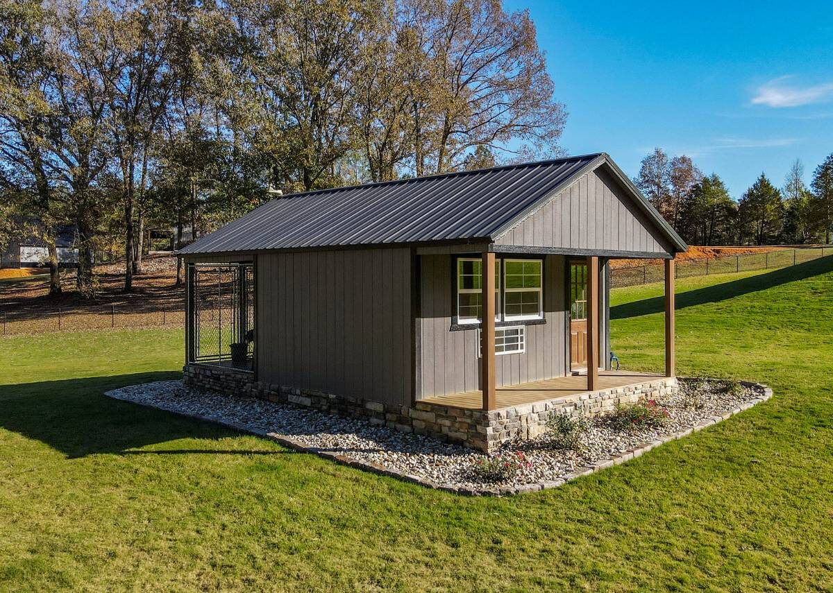 Beautiful backyard dog kennel with landscaping by Tiny Hive in Giddings, TX