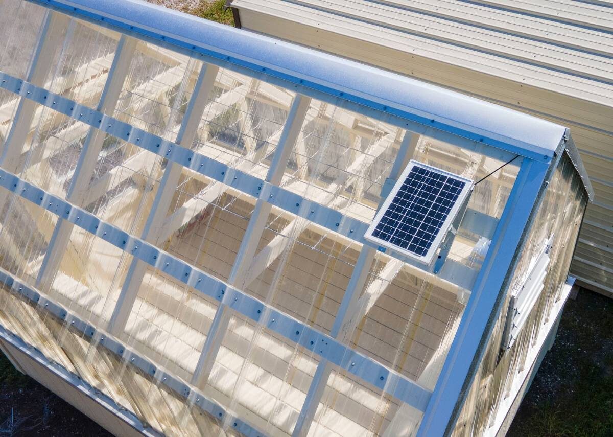 Solar fan in greenhouse at Tiny Hive in Giddings, TX