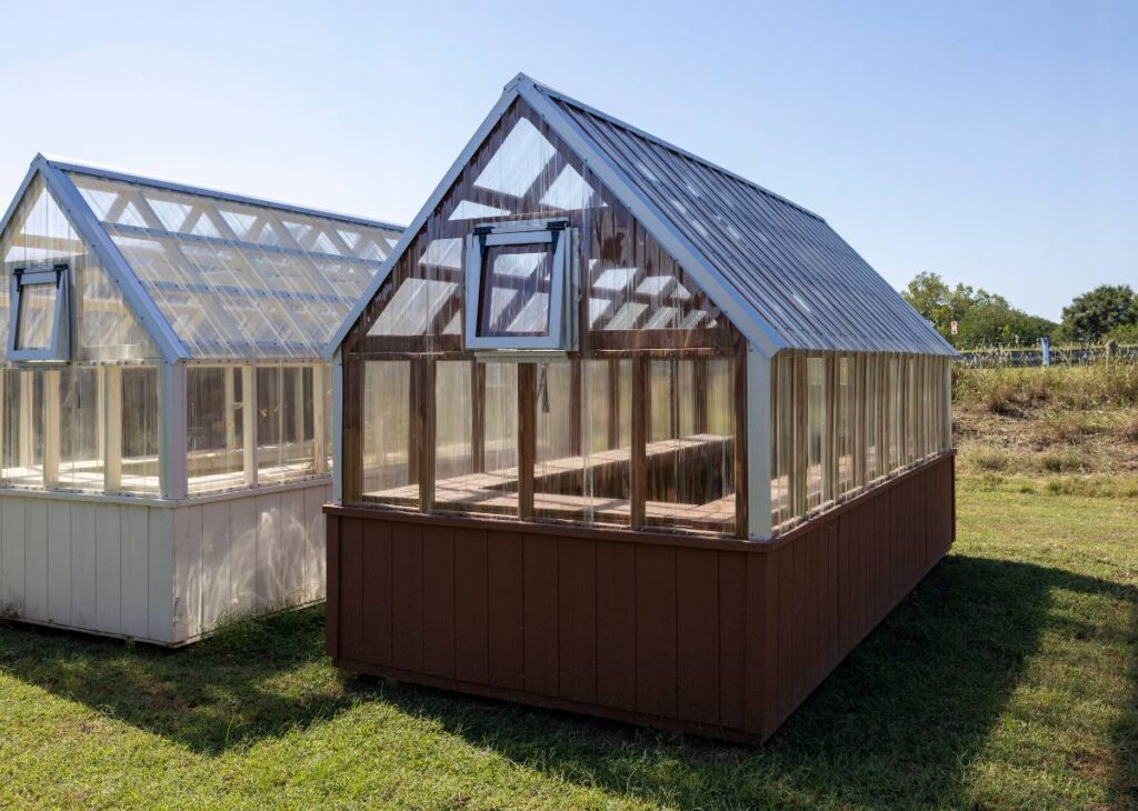 Red greenhouse by Derksen for sale at Tiny Hive Giddings