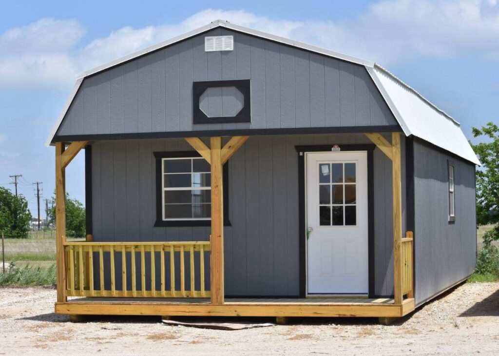 Gray loft barn cabin for sale at Tiny Hive in Giddings, TX