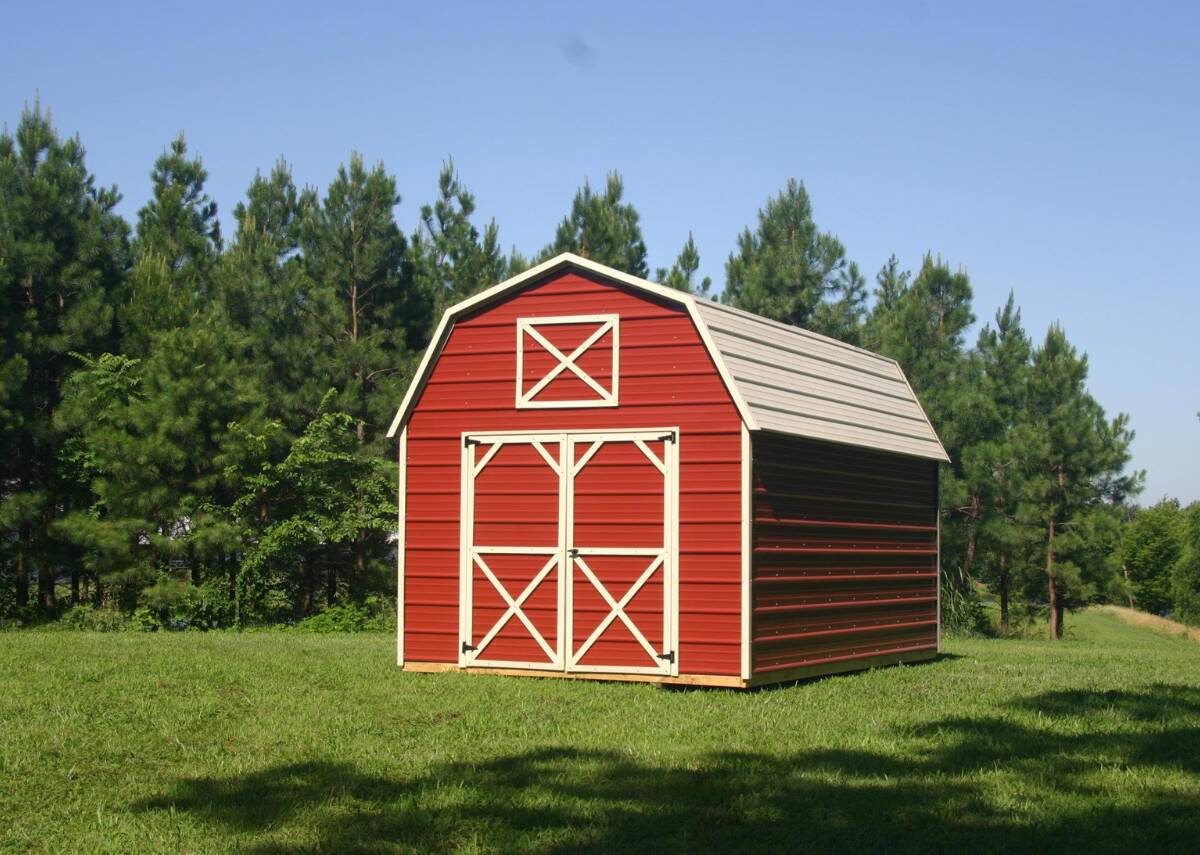 Red Derksen metal lofted barn for sale at Tiny Hive in Giddings, TX