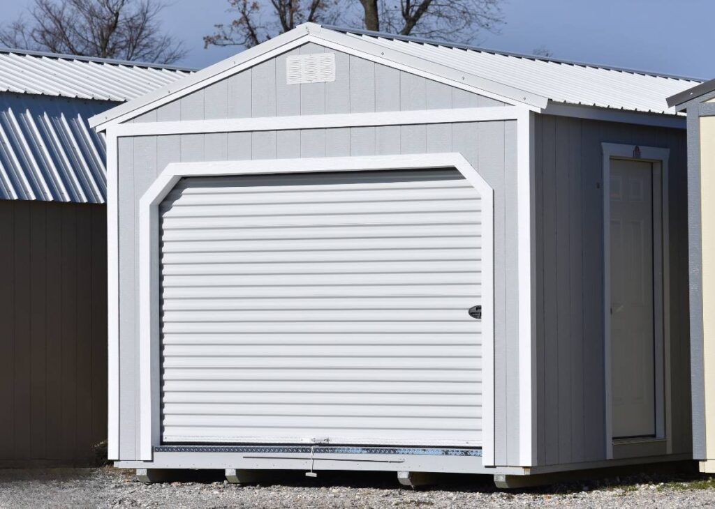 Painted portable garage in Giddings