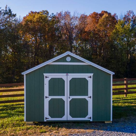 Green painted utility shed for sale at Tiny Hive in Giddings, TX