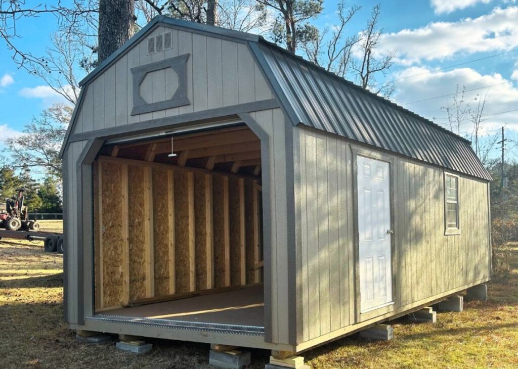 Lofted portable garage for sale at Tiny Hive in Giddings, TX