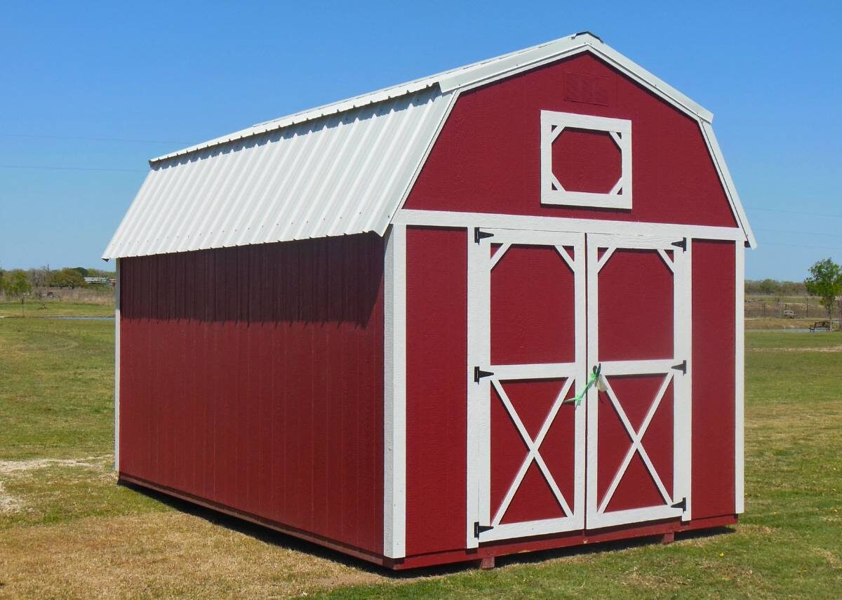 Red loft barn for sale at Tiny Hive in Giddings, TX
