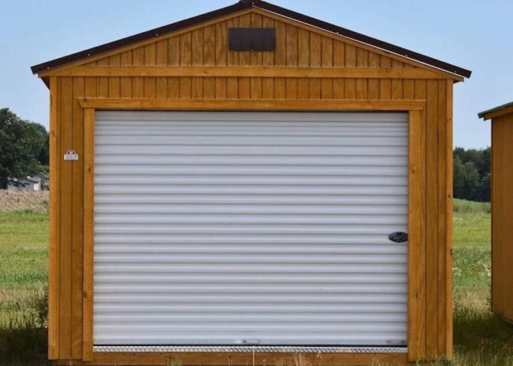 Treated wood portable garage at Tiny Hive in Giddings