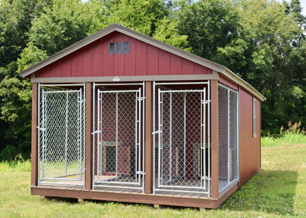 Red three box outdoor dog kennels for sale at Tiny Hive in Giddings, TX