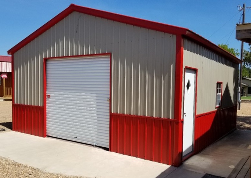 Red deluxe metal garage for sale at Tiny Hive in Giddings, TX