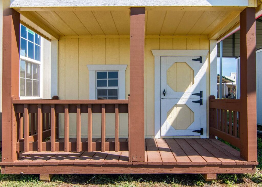 Childrens Wooden Playhouse at Tiny Hive in Giddings, TX
