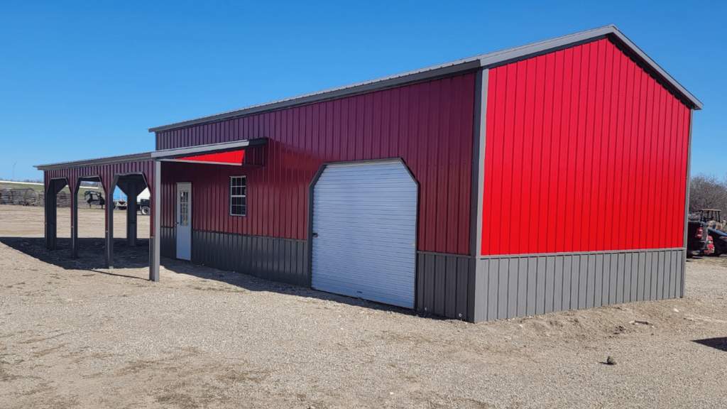 Red steel building for barndominium in Texas at Tiny Hive